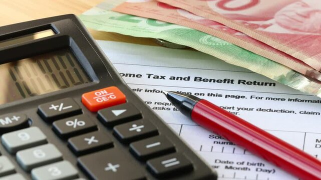 Canada Taxes and Finance. Canadians File Income Tax and Refund Benefits. Concept forms and documents to fill out
