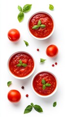 Three bowls of rich tomato sauce sit elegantly on a white surface, each garnished with fresh basil leaves. Ripe tomatoes and basil sprigs create a vibrant, inviting culinary display