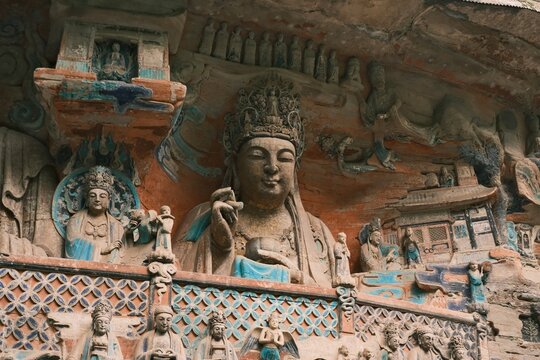 Dazu：A series of Chinese religious sculptures and carvings and UNESCO World Heritage Site located in Dazu District, Chongqing, China. The carvings date back as far as the 7th century AD