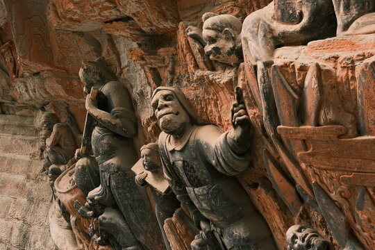 Dazu：A series of Chinese religious sculptures and carvings and UNESCO World Heritage Site located in Dazu District, Chongqing, China. The carvings date back as far as the 7th century AD