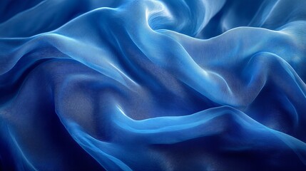 Fototapeta premium Elegant blue transparent fabric flowing smoothly in gentle waves