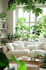 Obraz premium Bright living room with comfy sofa and abundant indoor plants.