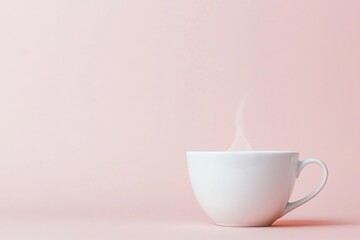 Fototapeta premium single white porcelain teacup with subtle steam rising in front of plain light-colored background