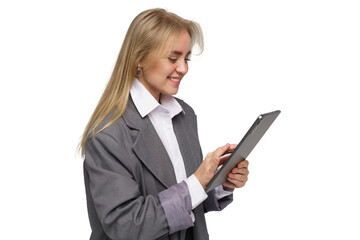 Young professional woman using tablet while smiling in a modern office environment