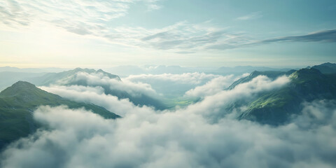 Obraz premium Soft Clouds Floating Above a Scenic Mountain Valley for a Dreamy and Tranquil Atmosphere