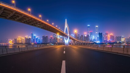 Fototapeta premium Modern bridge spanning road in illuminated city skyline at night, showcasing urban landscape and vibrant nightlife