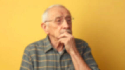 Blurred background capturing a compelling moment of intellectual exploration, with a yellow backdrop symbolizing innovation and clarity