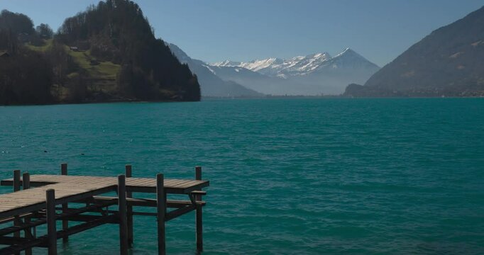 Iseltwald, Lake Brienz in Switzerland with Pier and Stunning View of Brienzer Rothorn, Jungfrau, Eiger, and M&ouml;nch