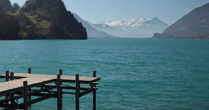 Iseltwald, Lake Brienz in Switzerland with Pier and Stunning View of Brienzer Rothorn, Jungfrau, Eiger, and M&ouml;nch
