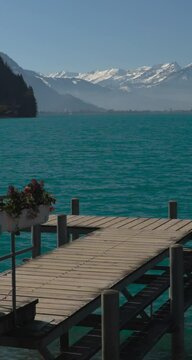 Iseltwald, Lake Brienz in Switzerland with Pier and Stunning View of Brienzer Rothorn, Jungfrau, Eiger, and M&ouml;nch