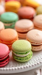 Fototapeta premium Colorful Macarons on Porcelain Plate - Perfect for Dessert Inspiration and Food Photography