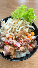 Chicken rice bowl sambal matah with salad vegetable and mayonaise
