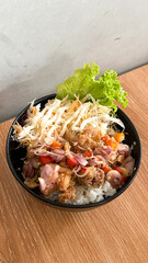Chicken rice bowl sambal matah with salad vegetable and mayonaise