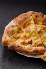 Hawaiian pizza with chicken, pineapple, corn and cheese