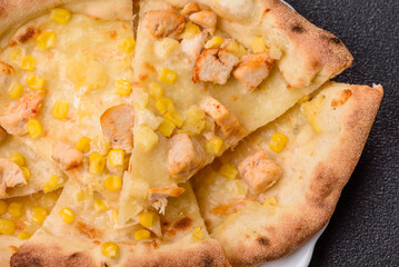Hawaiian pizza with chicken, pineapple, corn and cheese