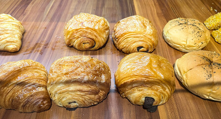 Display of delicious pastries croissant, korean garlic cheese bread, and sandwich