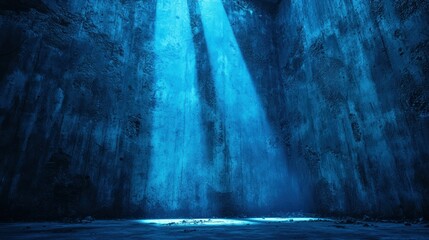 Fototapeta premium Deep blue cave with light beams illuminating a floor