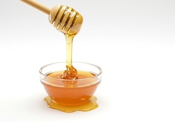 Golden Honey Pouring into Bowl - Sweet honey flowing from a wooden dipper into a glass bowl, symbolizing nature, health, sweetness, purity, and abundance