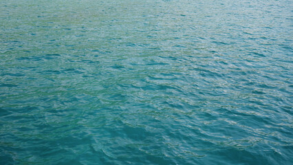 Turquoise Blue Indian ocean waves closeup from boat