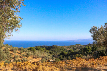 Mountain landscape with blue sky and sea