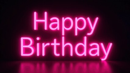 Neon pink happy birthday sign glowing in the dark