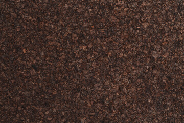 Texture of dark cork with oil finish