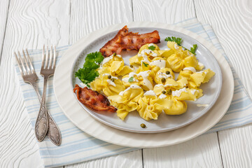 sacchettoni, pasta with bacon and cheese filling