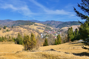Early spring view of the little mountain village Jaworki at the foot of the Pieniny and Beskid Sadecki Mountains, Poland