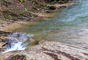 panoramic view and autumn walks along the canyon of the mountain river located in the gorge of the mountain range