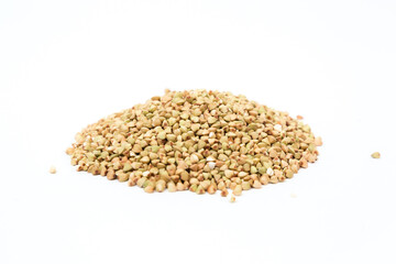 Green buckwheat isolated on white background, organic grain and healthy eating concept