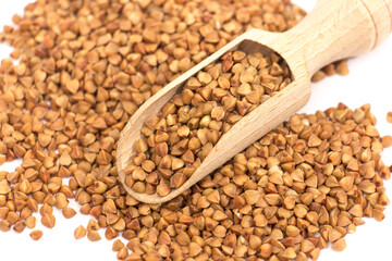 Buckwheat isolated on white background, organic grain and healthy eating concept