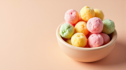 Fototapeta premium A bowl filled with colorful, dye-free candy on a soft pastel background.