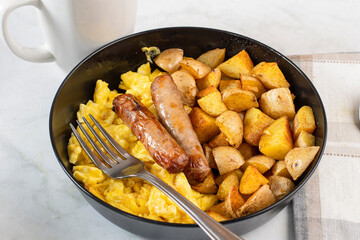  breakfast sausage  with scramble eggs and home fries