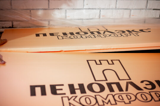 Laying polystyrene foam on the floor Penoplex comfort. House insulation. Anapa, Russia-06.07.2024