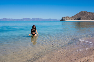 mujer en la playa