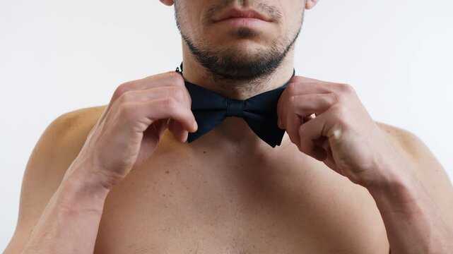 Shirtless Man Wearing Sleek Bow Tie