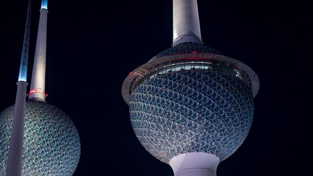Close up view of 1 of the 3 towers of the famous Kuwait Towers in Kuwait City. Seen at night