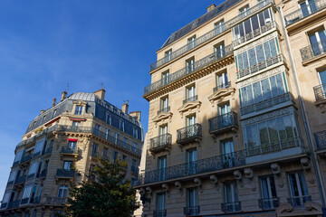 Fototapeta premium Exterior architecture of Traditional French house with typical balconies and windows in Paris. France.