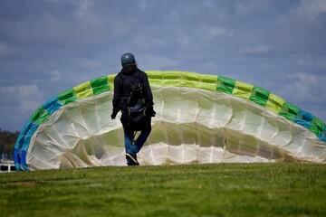 paraglider flight preparations are under way