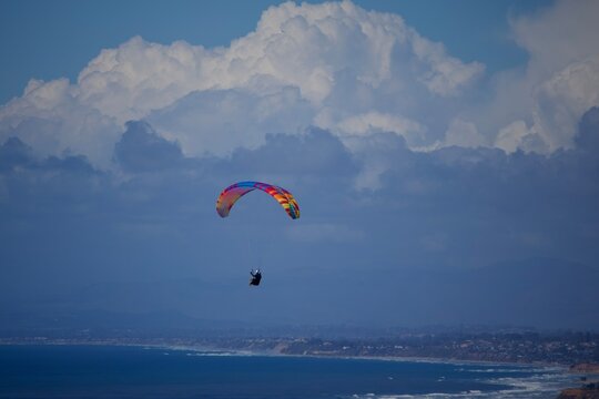 paraglider in the blue sky