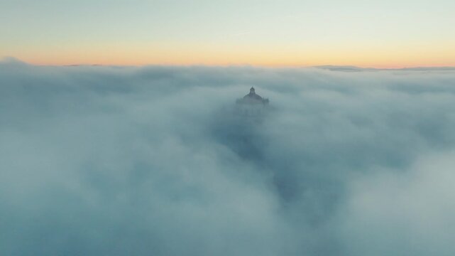 Morning in the City of Porto, Portugal.
A serene view of Porto, Portugal, enveloped in morning fog. The soft mist creates a dreamlike atmosphere over the historic cityscape.
