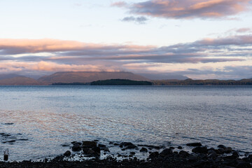 sunset aerial view of the Queen Charlotte Strait seen from Malcolm Island, British Columbia Canada with a dramatic sunset sky