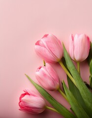 Obraz premium Beautiful composition spring flowers. Bouquet of pink tulips flowers on pastel pink background. flat lay top view with copy space 