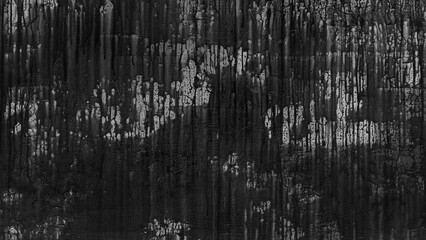 A black and white photo of a burnt out forest with charred trees and blackened leaves. Scene is somber and melancholic, as the destruction of the forest is a reminder of the fragility of nature