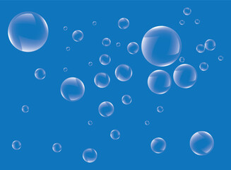 transparent bubbles soap blue background