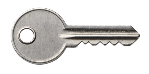 Detailed view of a silver house key with a smooth round head and sharp grooves