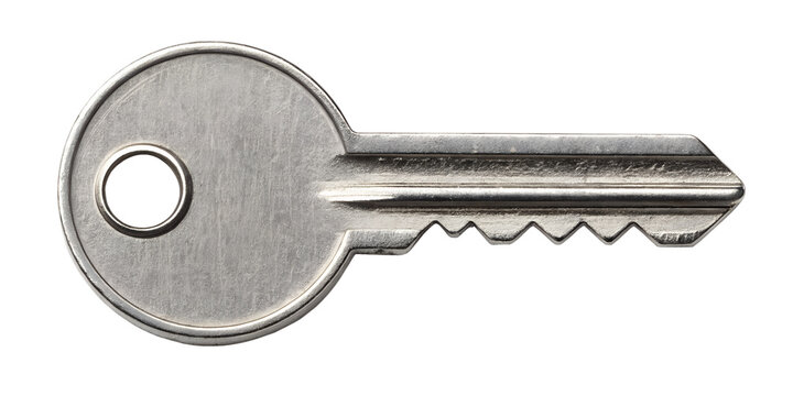 Detailed view of a silver house key with a smooth round head and sharp grooves