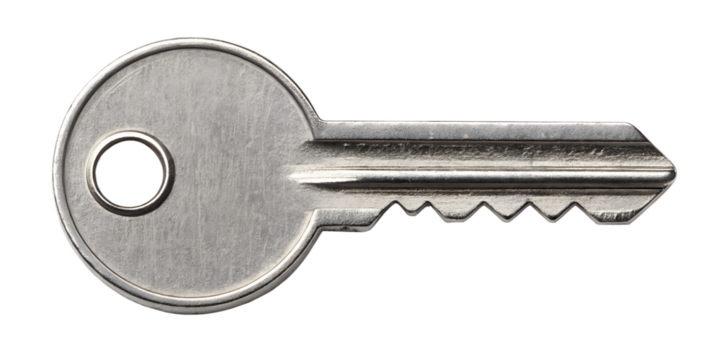 Detailed view of a silver house key with a smooth round head and sharp grooves
