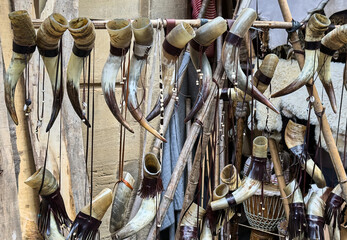 Handmade drinking horns displayed at a medieval market