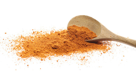 Mexican taco seasoning, pile in wooden spoon isolated on white, side view	